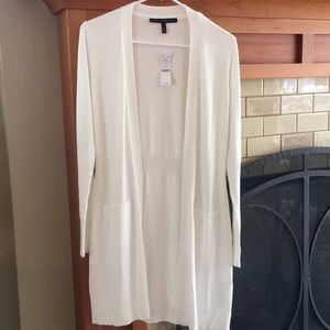 White cardigan sweater.